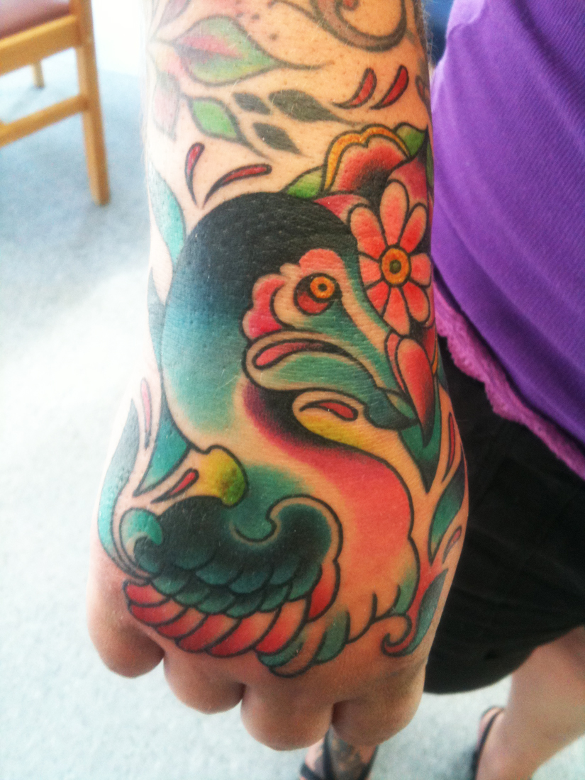 phoenix from a hand tattoo